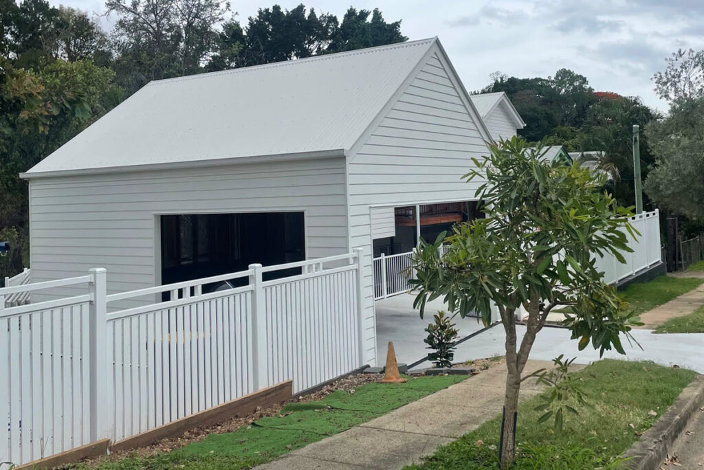 Recently Built White Shed To Store A Caravan